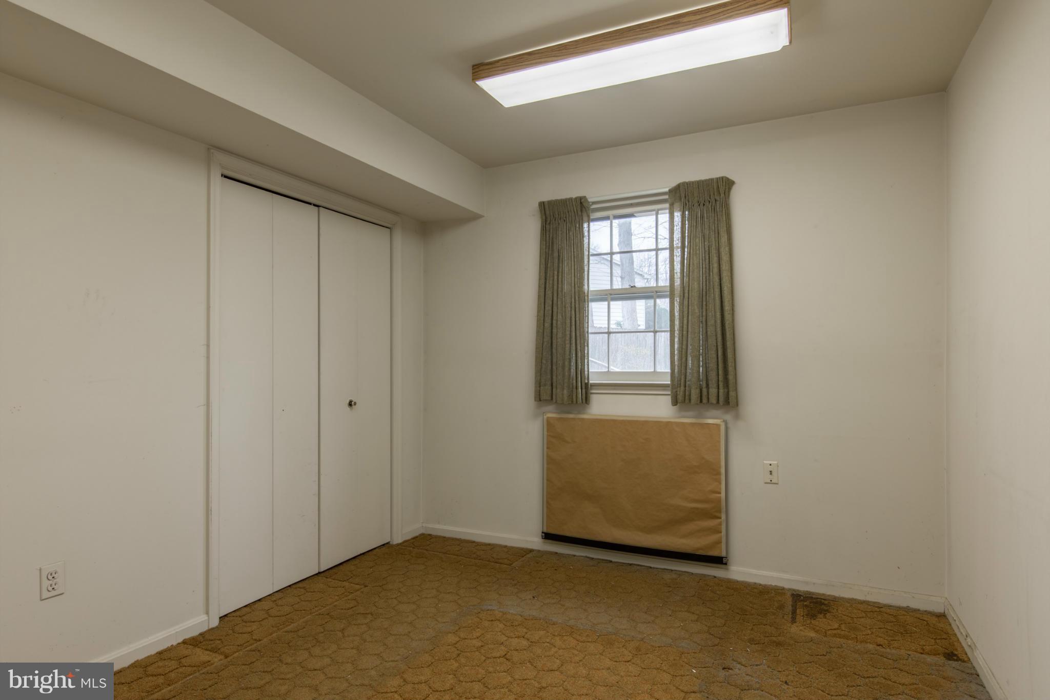 9215 Setter Place Springfield, VA 22153 - Photo 20 of 23 a view of an empty room and window