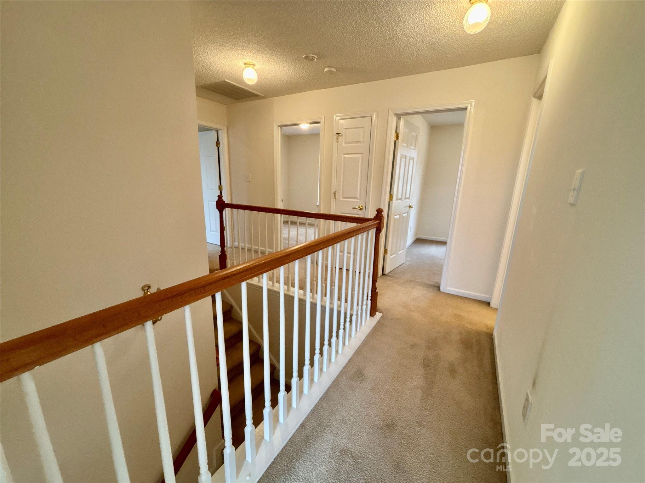 1600 Trotters Ridge Road Stanfield, NC 28163 - Photo 27 of 32 a view of a hallway with wooden floor and entryway