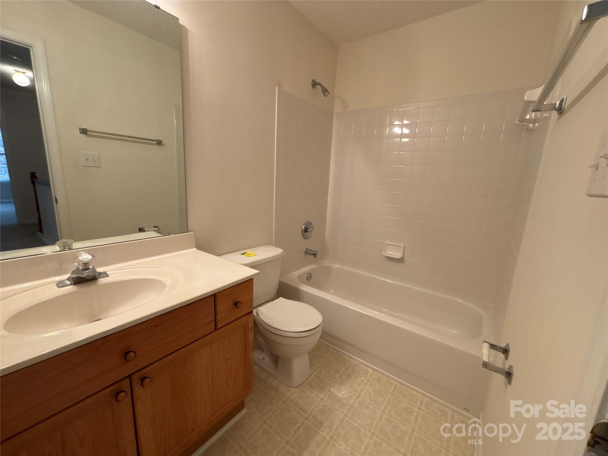 1600 Trotters Ridge Road Stanfield, NC 28163 - Photo 28 of 32 a bathroom with a sink a toilet and shower