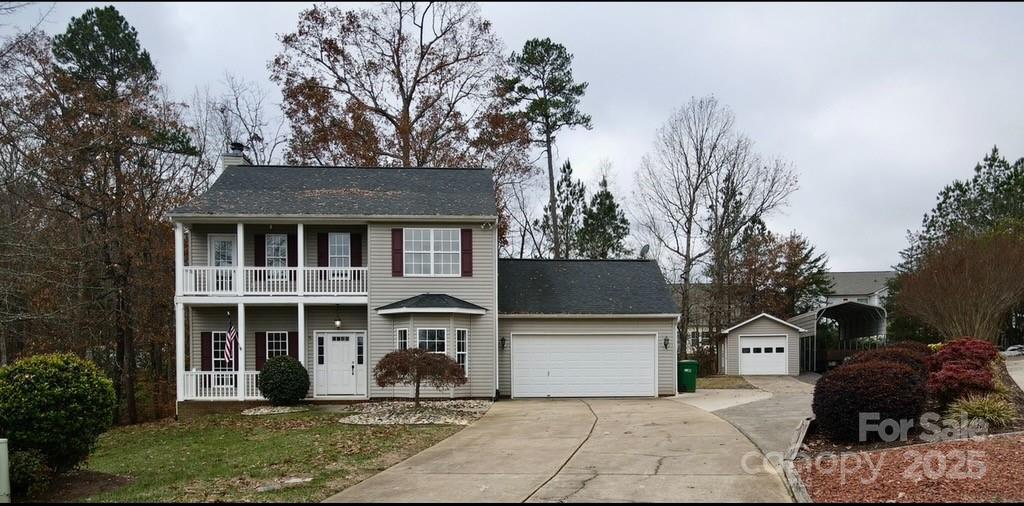 1600 Trotters Ridge Road Stanfield, NC 28163 - Photo 3 of 32 a front view of a house with garden