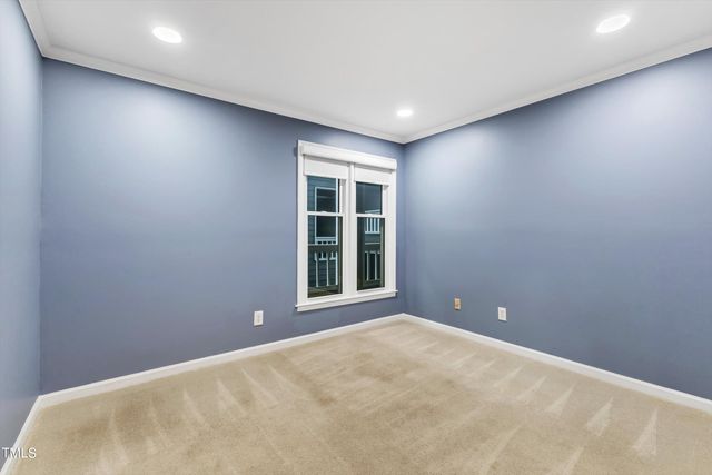 a view of a potted plant sitting in front of a house