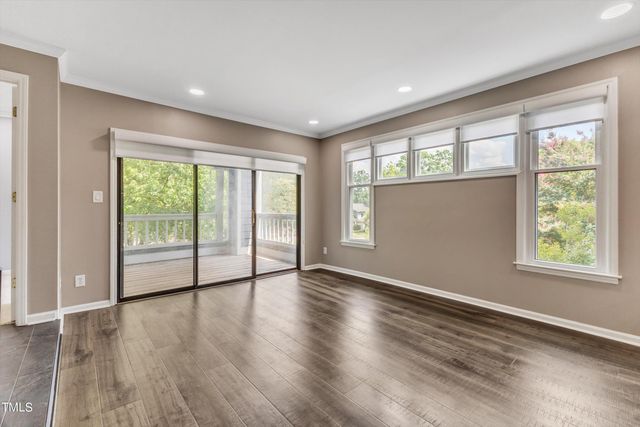 a view of entryway with wooden floor
