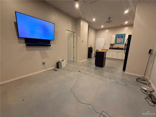 a bathroom with a double vanity sink mirror and toilet