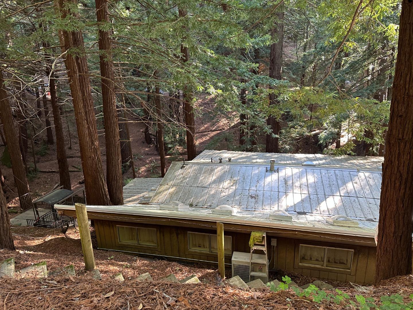 121 La Honda Road Woodside, CA 94062 - Photo 16 of 22 a view of a backyard with a iron fence