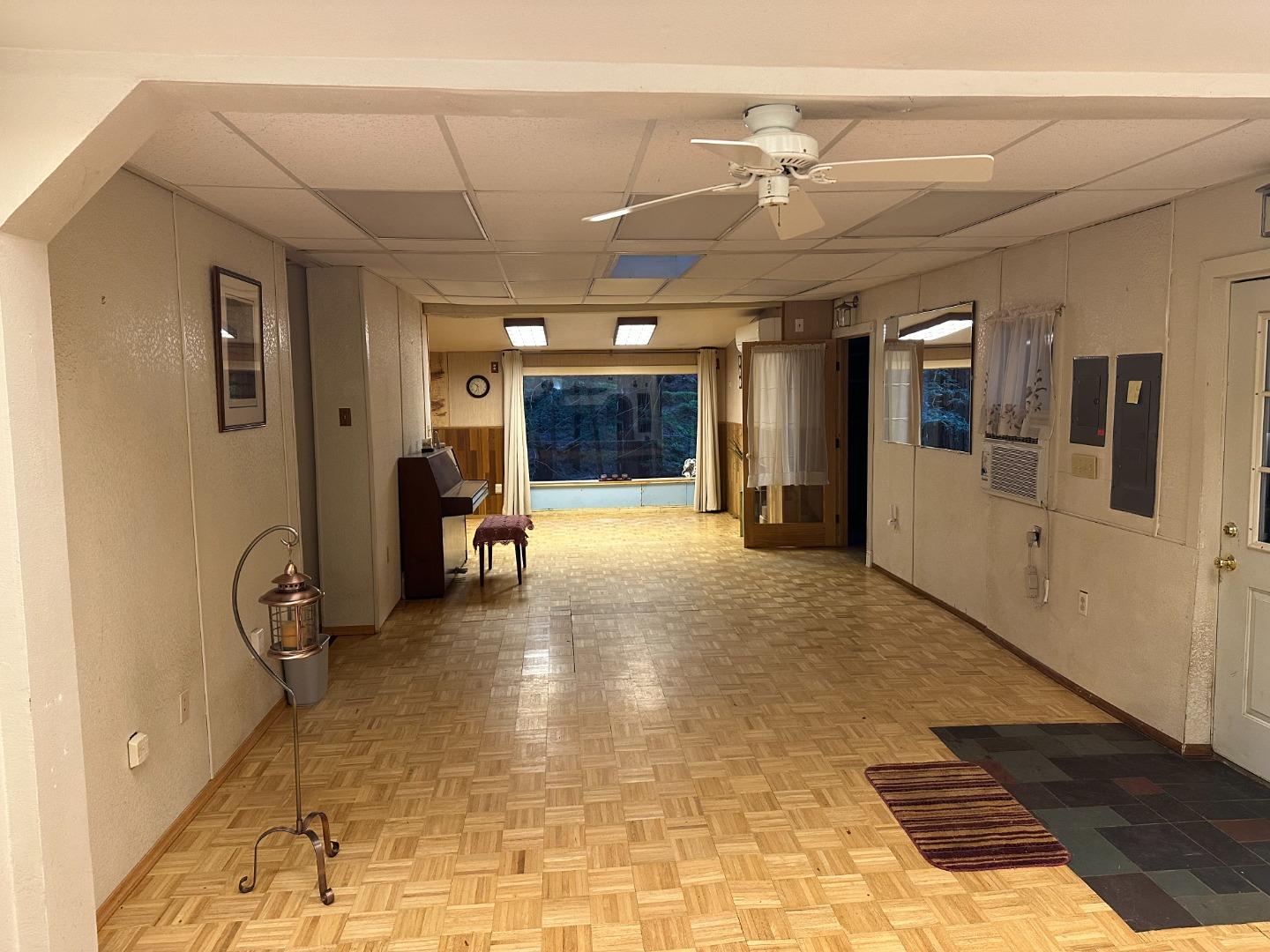 121 La Honda Road Woodside, CA 94062 - Photo 4 of 22 a view of a livingroom with furniture and a window