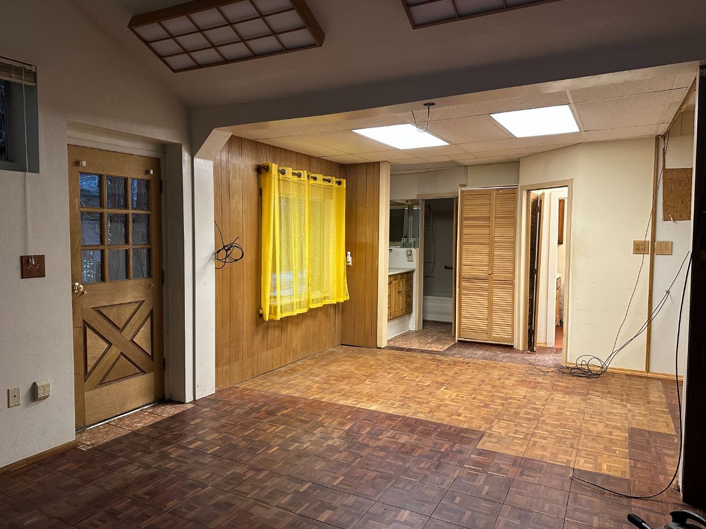 121 La Honda Road Woodside, CA 94062 - Photo 7 of 22 an empty room with closet and windows