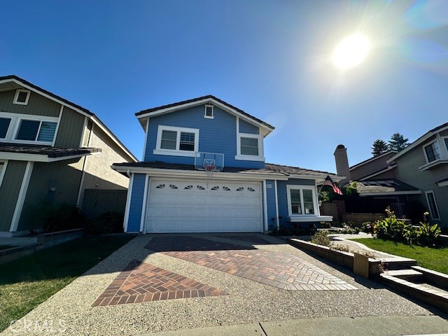 a front view of a house with yard