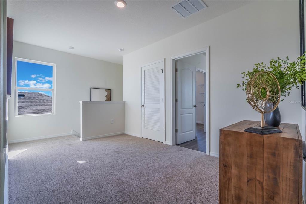 3415 Nettle Loop Tavares, FL 32778 - Photo 13 of 28 a view of a room with a potted plant