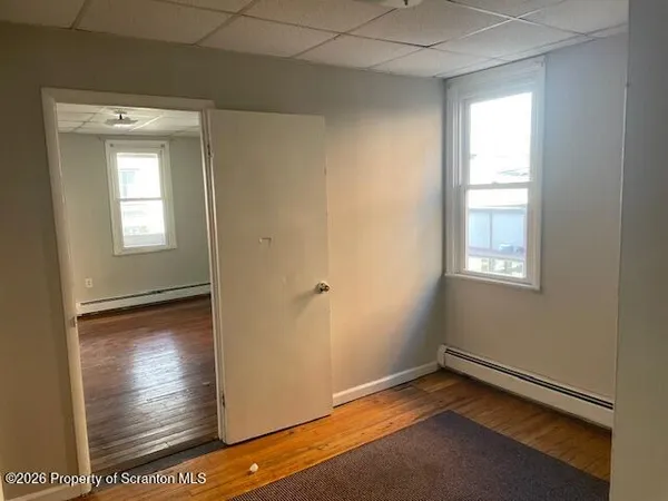 a view of an empty room and window