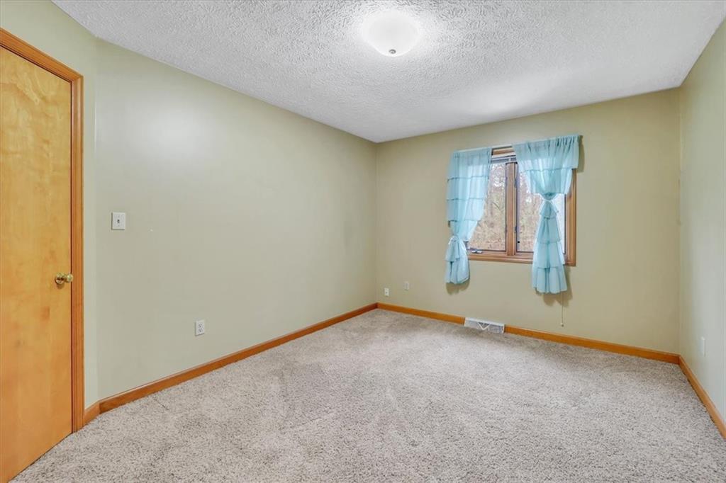 351 Cobblestone Circle McKees Rocks, PA 15136 - Photo 17 of 23 an empty room with windows