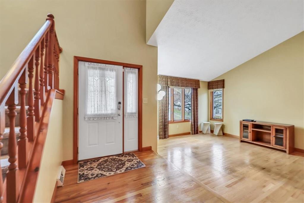 351 Cobblestone Circle McKees Rocks, PA 15136 - Photo 2 of 23 a view of an empty room with window and a kitchen