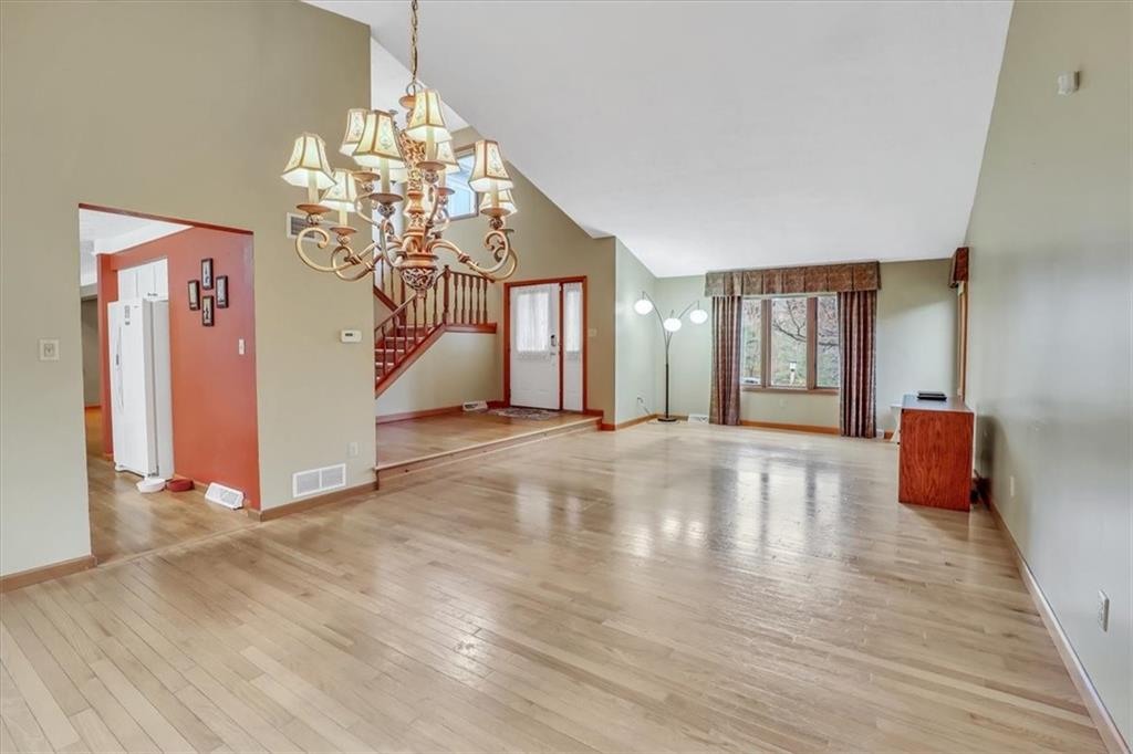 351 Cobblestone Circle McKees Rocks, PA 15136 - Photo 3 of 23 a view of a livingroom with wooden floor and windows