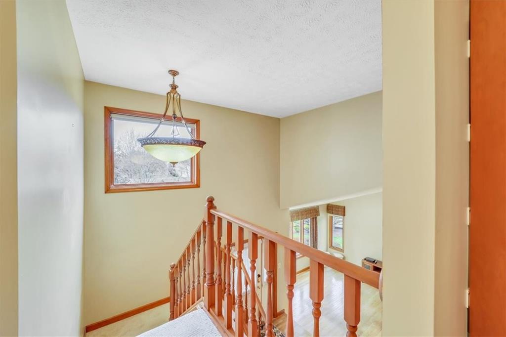351 Cobblestone Circle McKees Rocks, PA 15136 - Photo 9 of 23 a view of entryway and hall with wooden floor