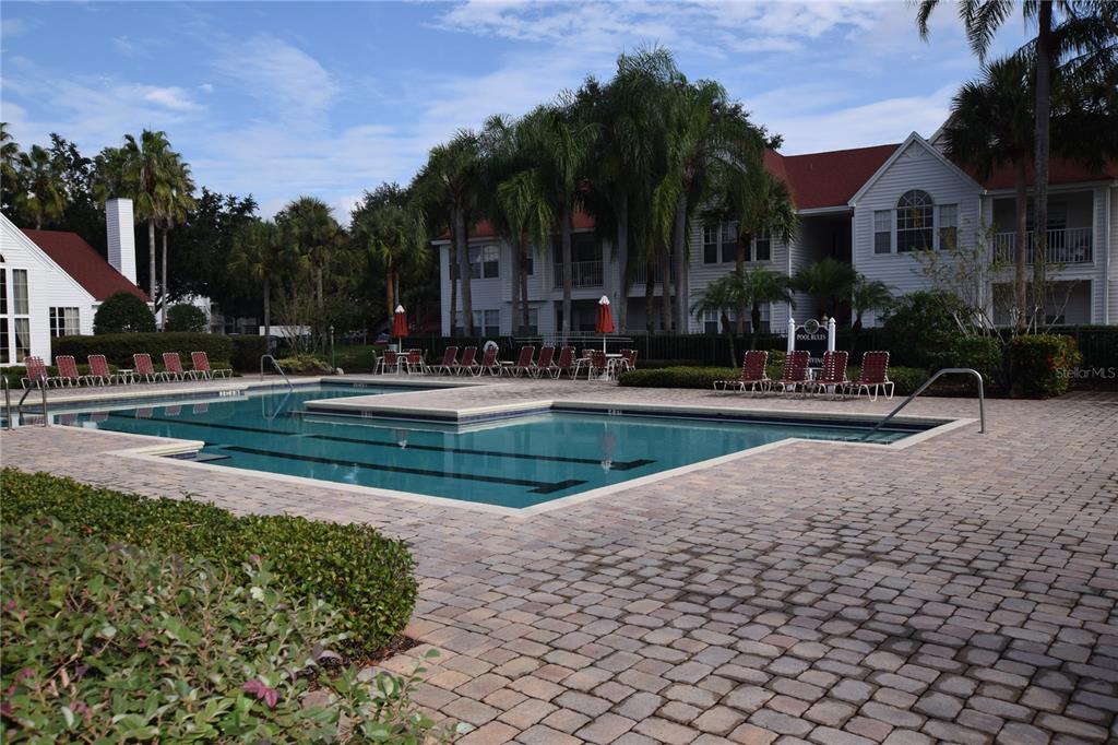 11550 Westwood Boulevard, Unit 1215 Orlando, FL 32821 - Photo 14 of 16 a view of a house with a yard and plants