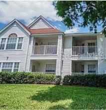 11550 Westwood Boulevard, Unit 1215 Orlando, FL 32821 - Photo 16 of 16 front view of a house with a yard