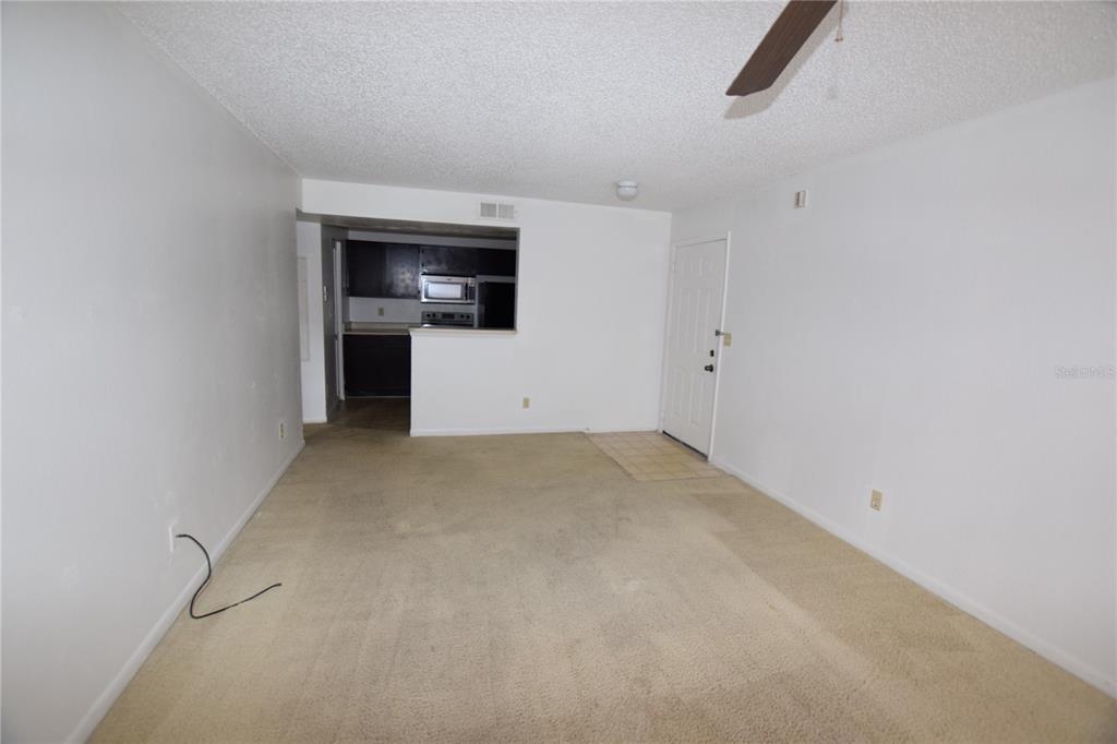 11550 Westwood Boulevard, Unit 1215 Orlando, FL 32821 - Photo 3 of 16 a view of a storage & utility room with a sink