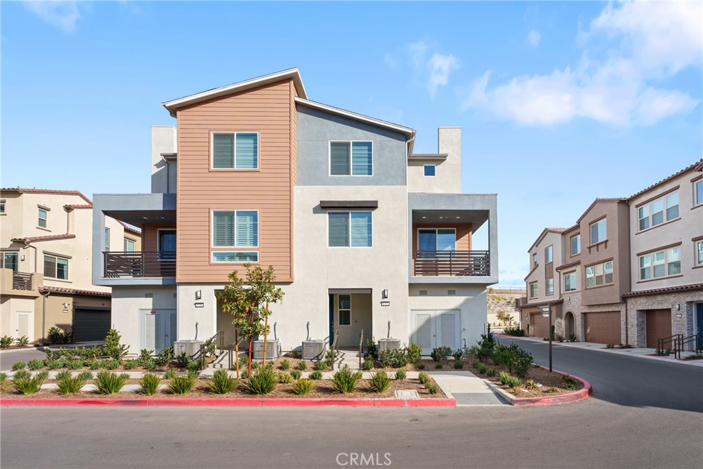 a front view of a building with street view