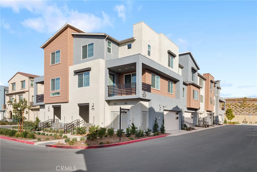 1713 Jade Road Rancho Mission Viejo, CA 92694 - Photo 3 of 53 a front view of a building with street view