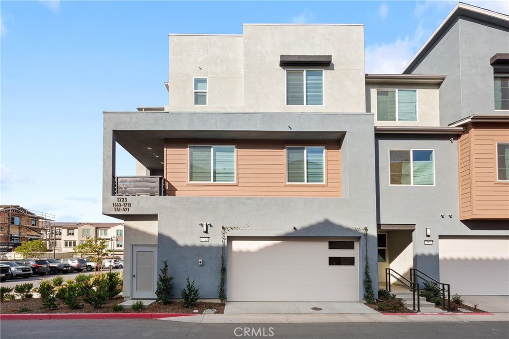 1713 Jade Road Rancho Mission Viejo, CA 92694 - Photo 47 of 53 a front view of a house with garage
