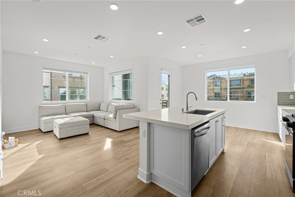 1713 Jade Road Rancho Mission Viejo, CA 92694 - Photo 8 of 53 a living room with furniture and a large window