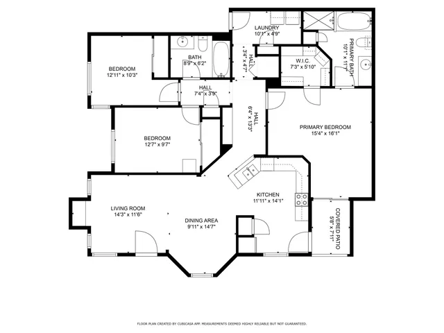 a picture of a bench in front of a wall