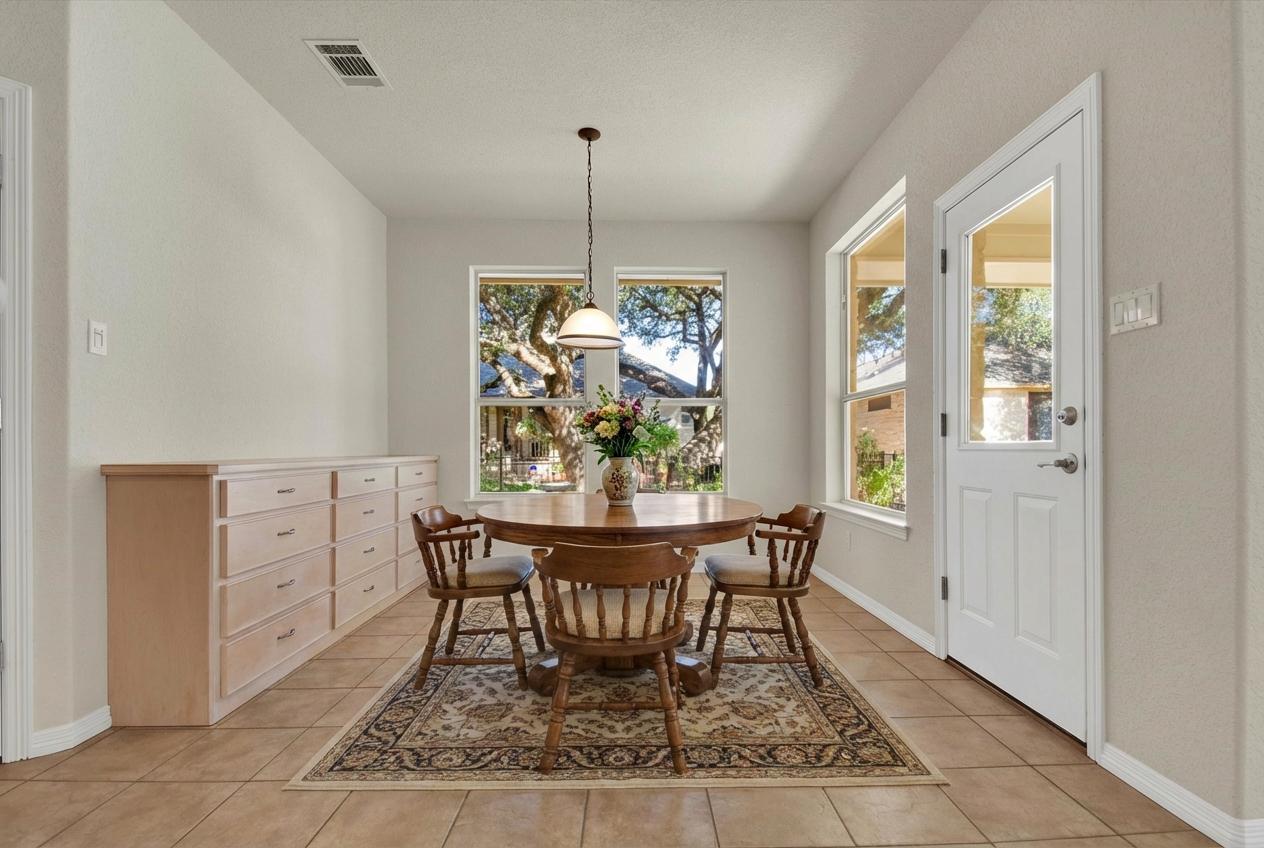 102 Lavaca Lane Georgetown, TX 78628 - Photo 11 of 30 Dining area with plenty of natural light