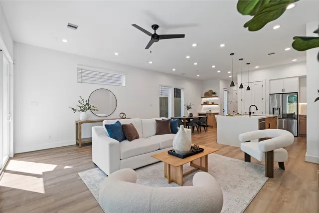 a living room with couch and a window