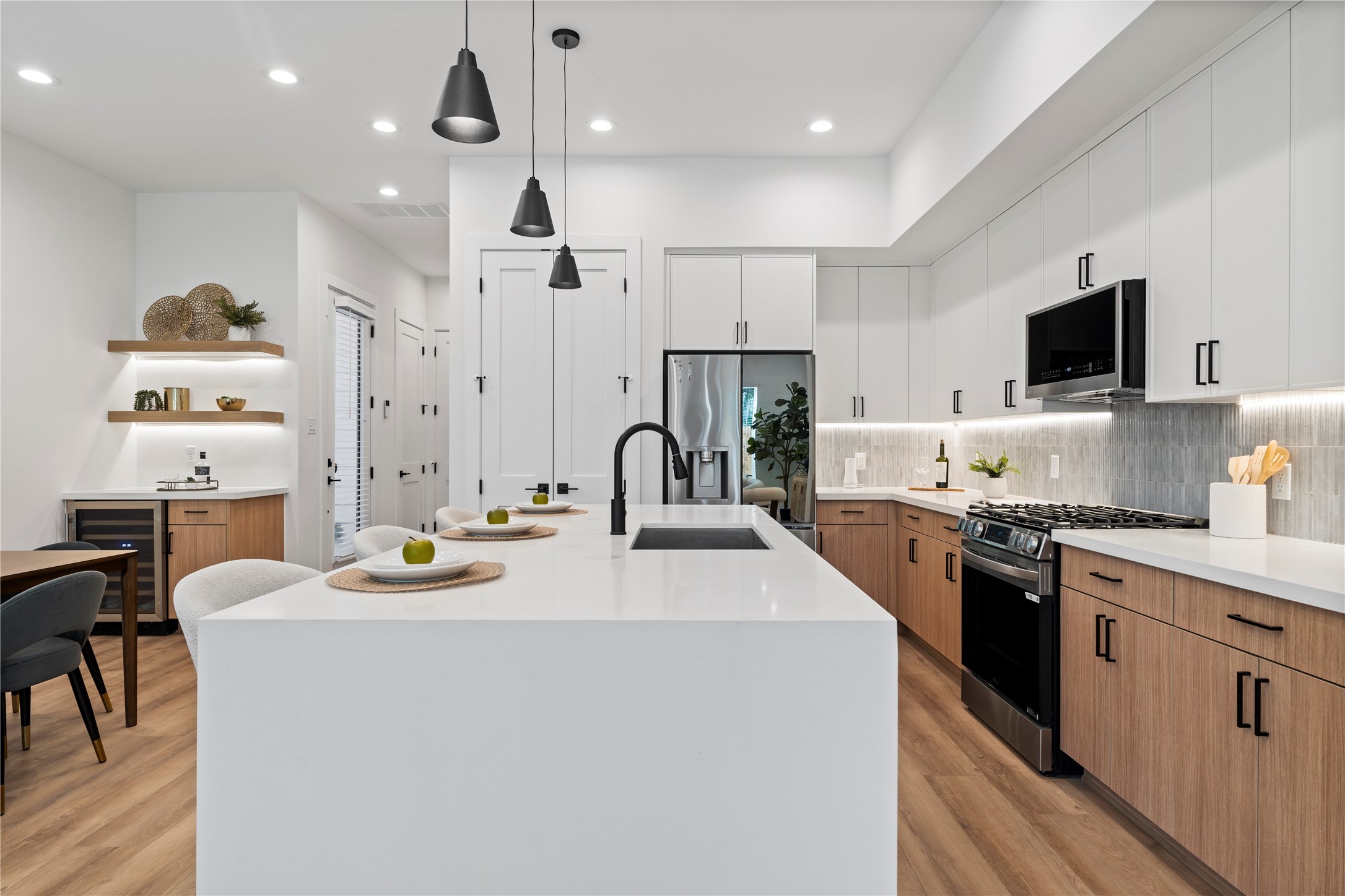 2706 Fox Street Houston, TX 77003 - Photo 2 of 39 a kitchen with appliances a sink and cabinets