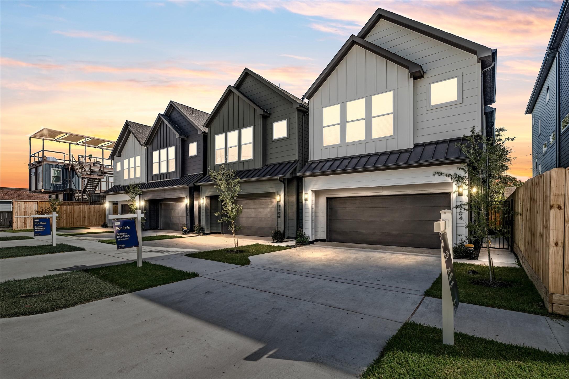 2706 Fox Street Houston, TX 77003 - Photo 37 of 39 a front view of a house with a yard and garage