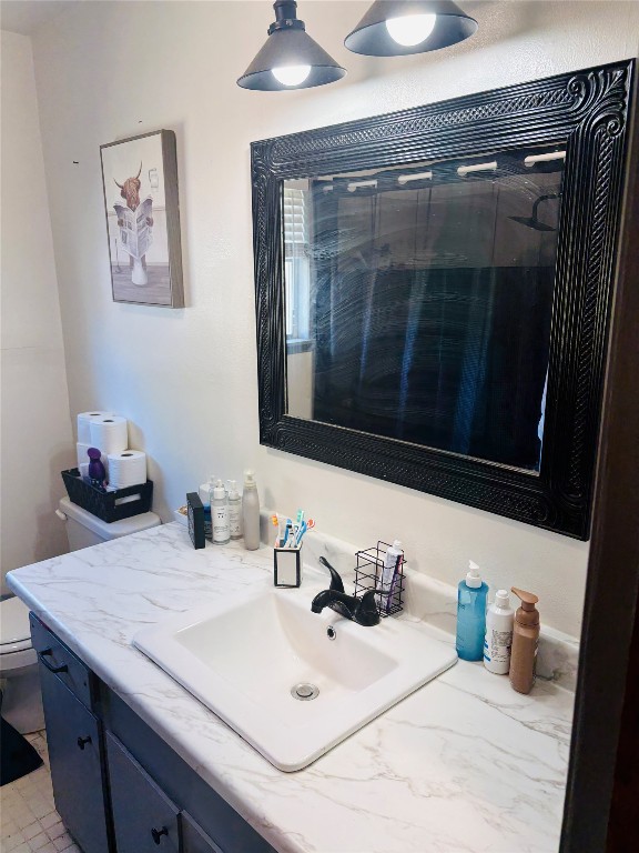 2291 State Highway 71 Columbus, TX 78934 - Photo 10 of 12 a bathroom with a sink and a mirror