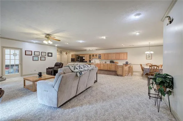 a white stove top oven sitting inside of a kitchen