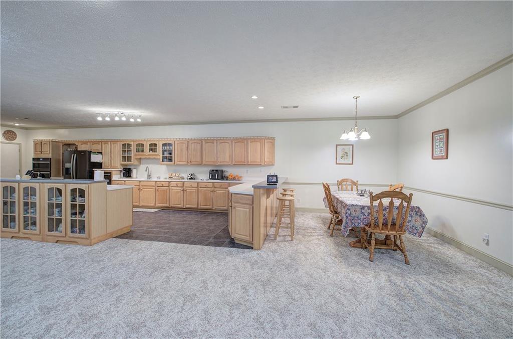 265 Evans Drive Buchanan, GA 30113 - Photo 12 of 123 a living room with furniture and view of kitchen