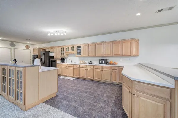 a bedroom with bed and a window