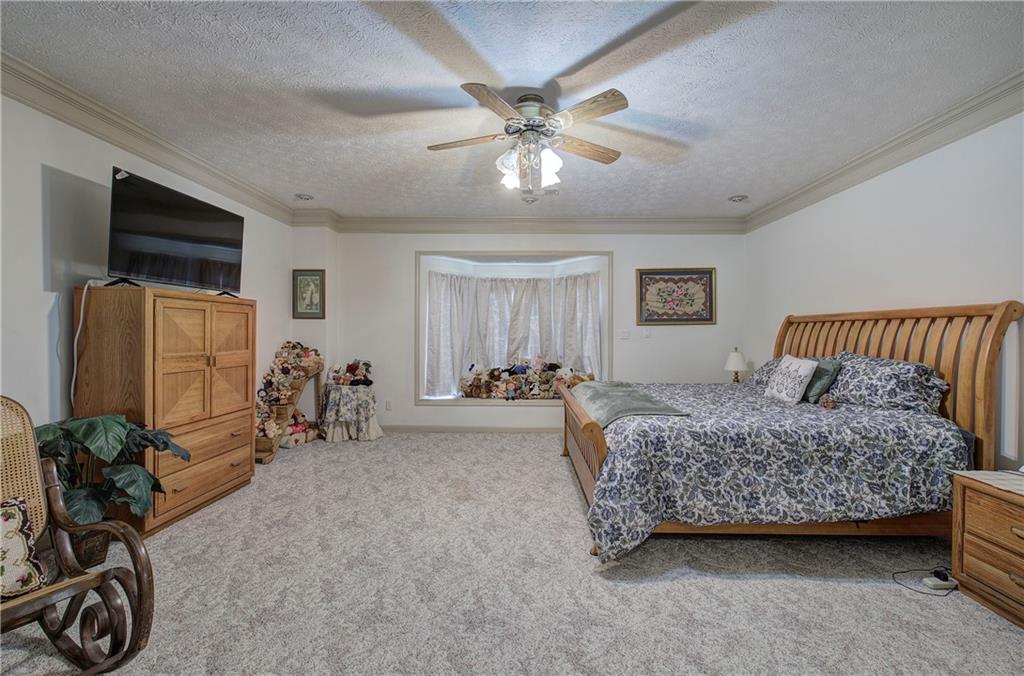 265 Evans Drive Buchanan, GA 30113 - Photo 32 of 123 a bedroom with bed and a window