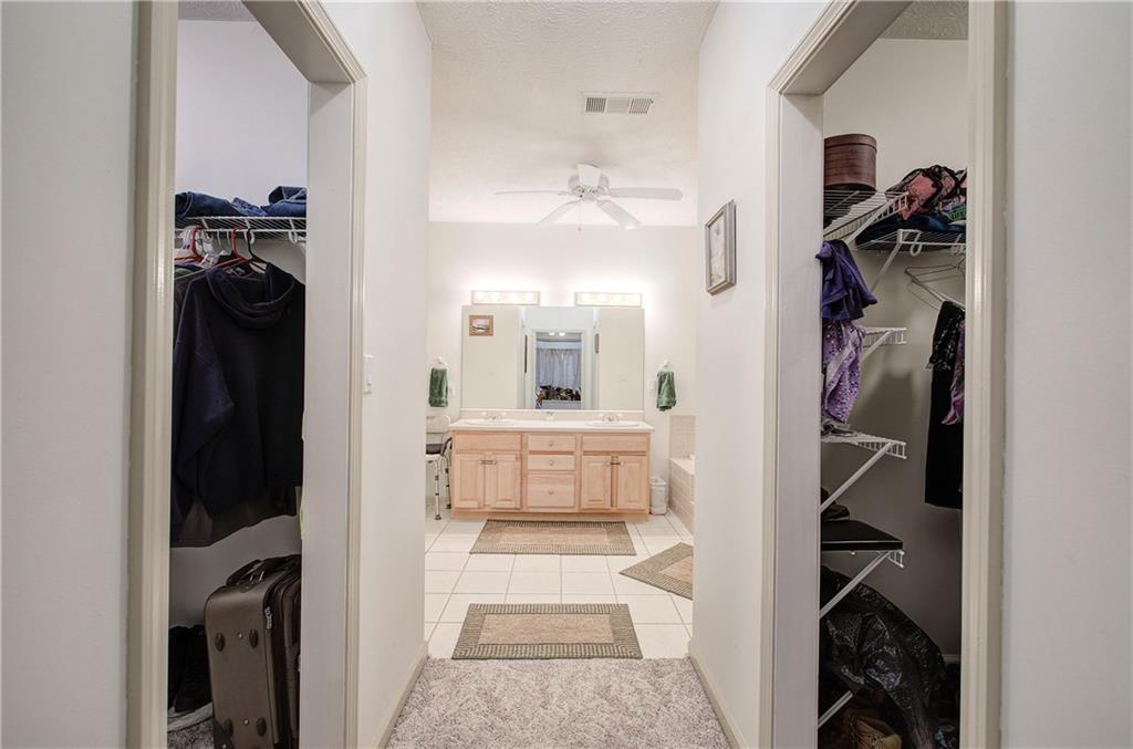 265 Evans Drive Buchanan, GA 30113 - Photo 33 of 123 a view of walk in closet with clothes and shoes