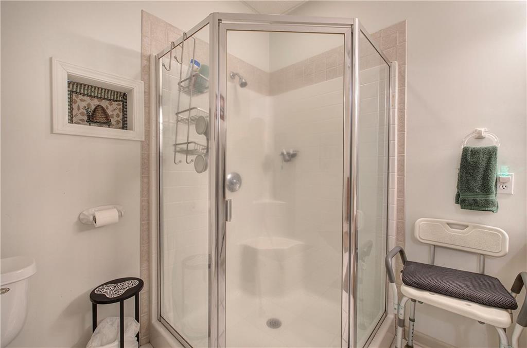 265 Evans Drive Buchanan, GA 30113 - Photo 36 of 123 a bathroom with a shower and a toilet