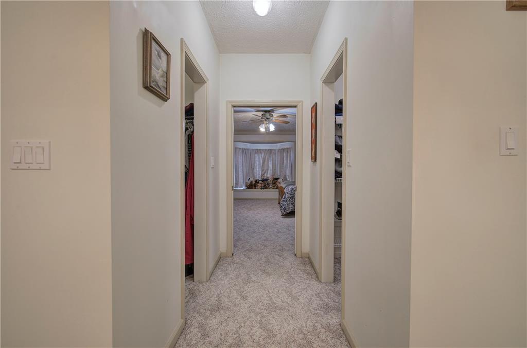 265 Evans Drive Buchanan, GA 30113 - Photo 37 of 123 a view of a hallway with closet and wooden floor