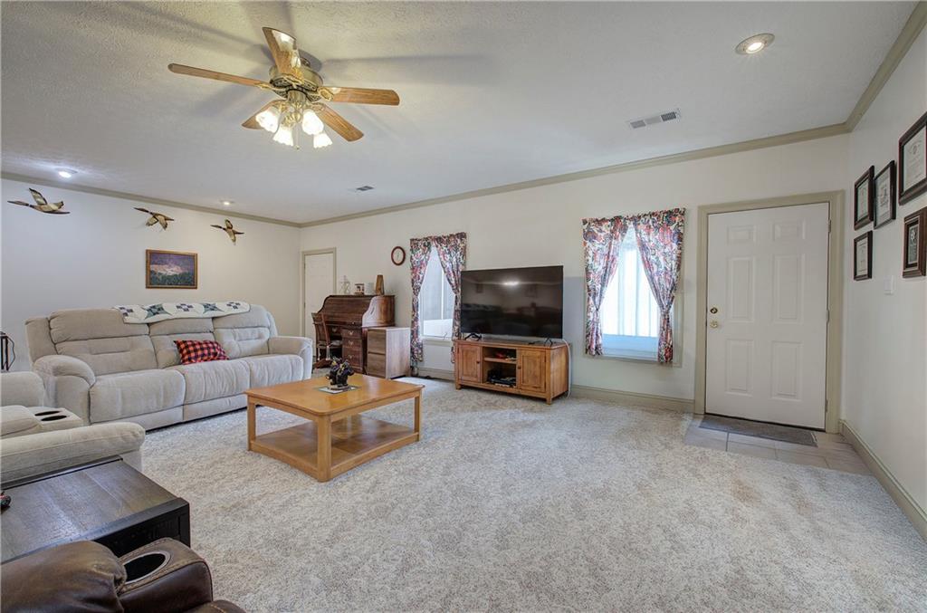 265 Evans Drive Buchanan, GA 30113 - Photo 8 of 123 a living room with furniture and a flat screen tv