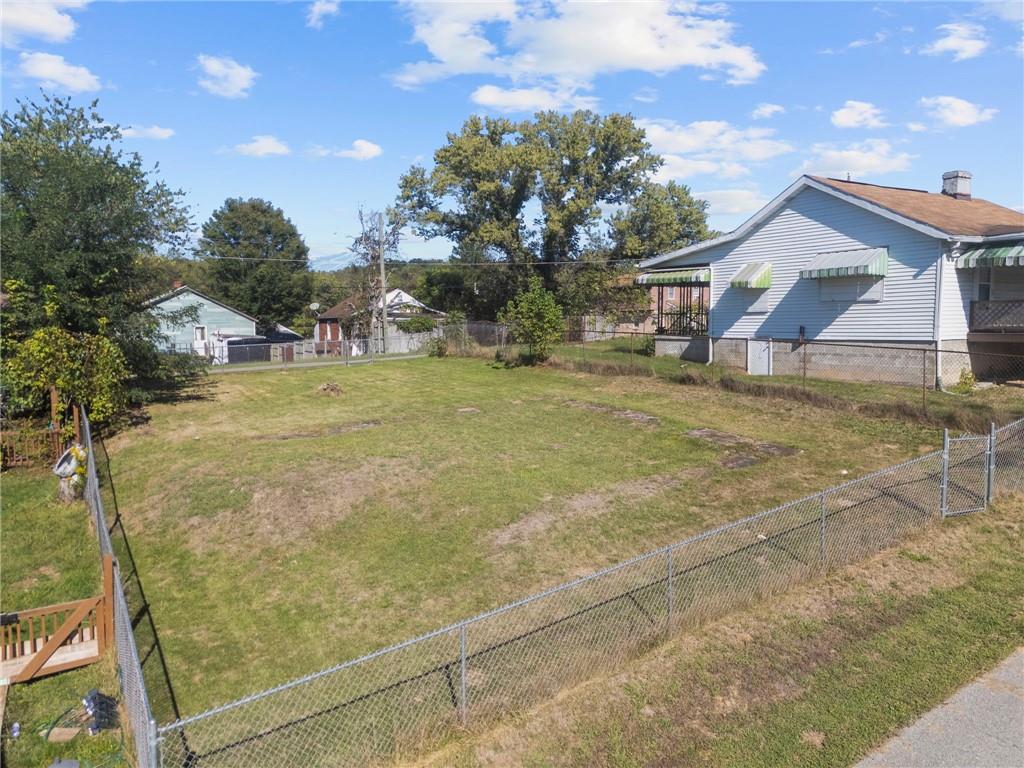 0 Pine Street Clarksville, PA 15322 - Photo 5 of 11 a view of a house with a yard and garage
