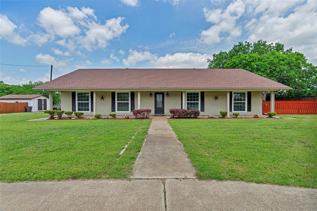 Large front porch spans the entire length of house