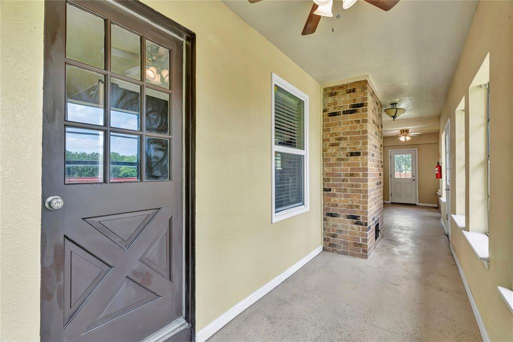 4405 Ray White Road Fort Worth, TX 76244 - Photo 28 of 36 entry to laundry/mudroom from sunroom