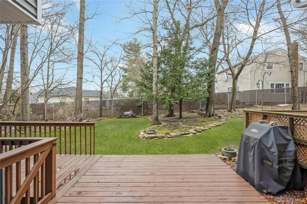 a view of a patio with a yard