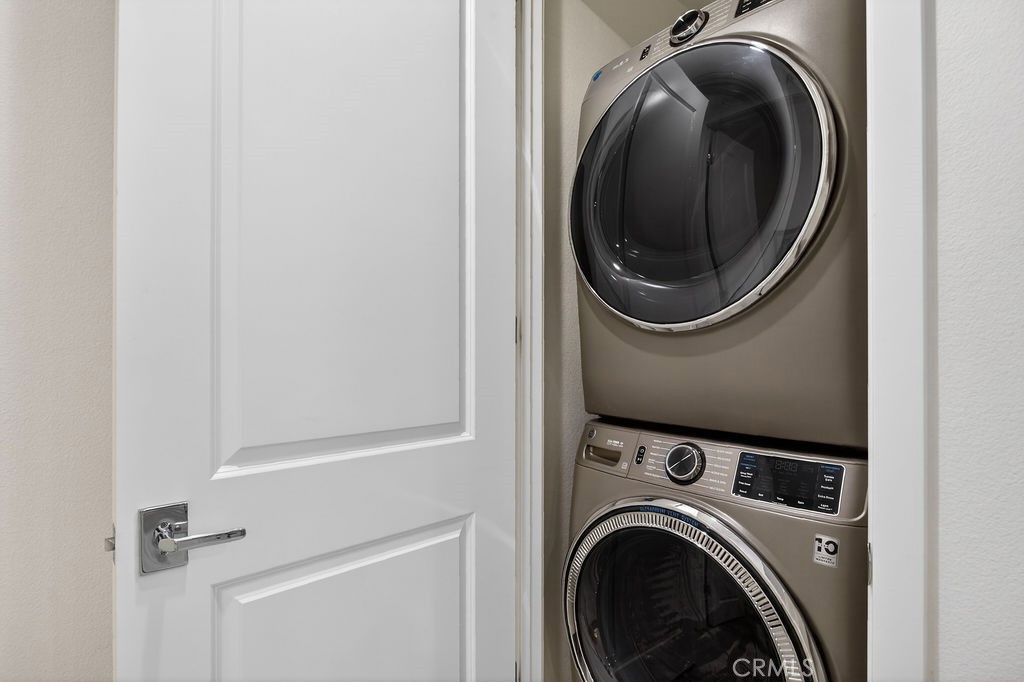985 Doheny Way Dana Point, CA 92629 - Photo 12 of 21 a close view of a utility room with dryer and washer