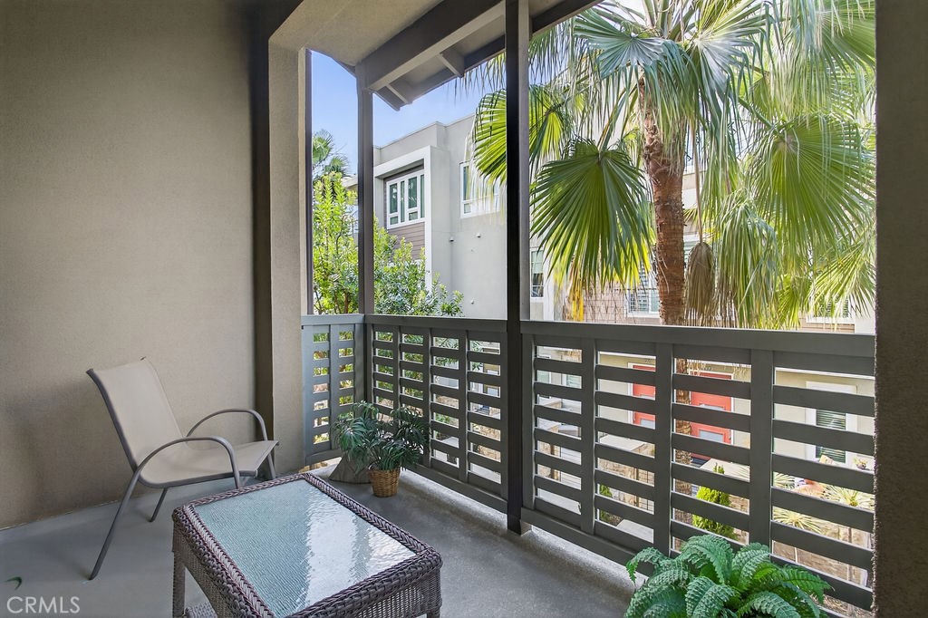 985 Doheny Way Dana Point, CA 92629 - Photo 13 of 21 a view of balcony with two chairs and a potted plant