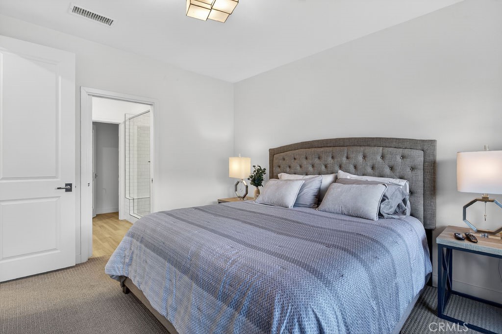 985 Doheny Way Dana Point, CA 92629 - Photo 15 of 21 a bedroom with a bed and a night stand