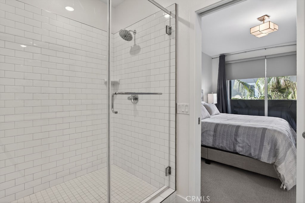 985 Doheny Way Dana Point, CA 92629 - Photo 18 of 21 a bedroom with a bed and a window
