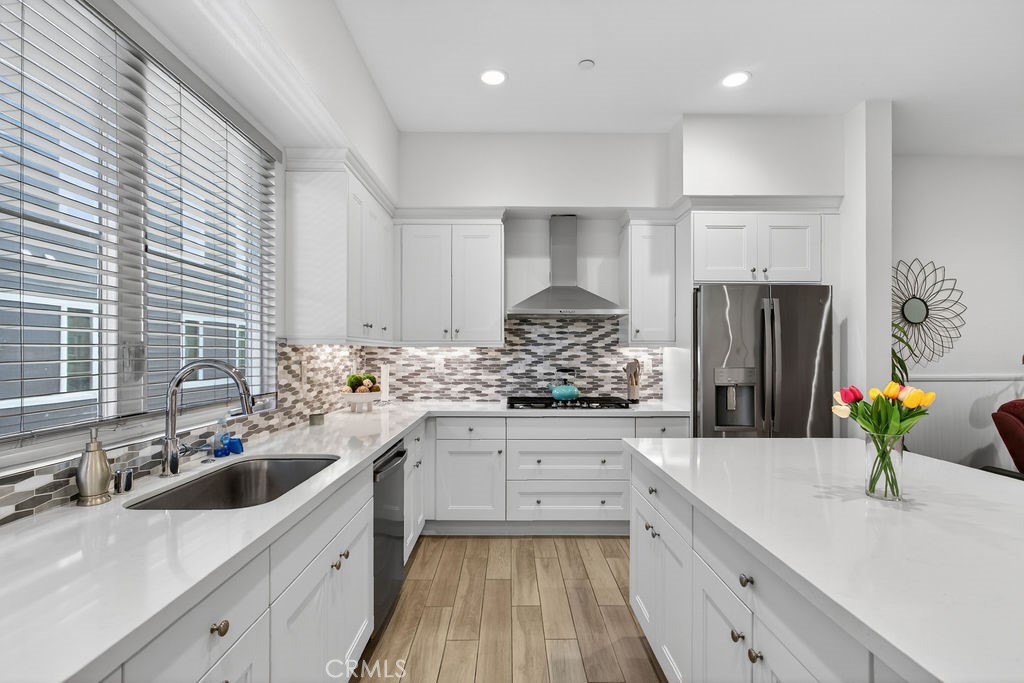 985 Doheny Way Dana Point, CA 92629 - Photo 10 of 21 a kitchen with a sink stove and cabinets