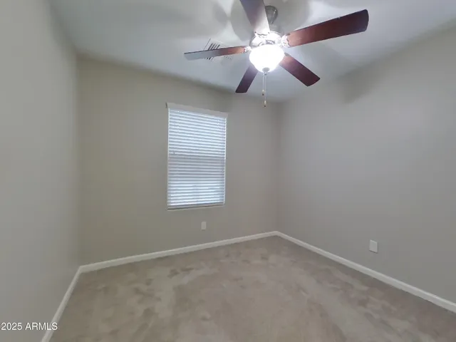 a bathroom with a sink double vanity and a mirror