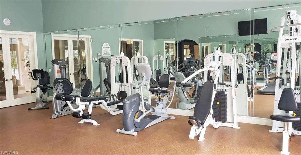 3530 Lansing Loop, Unit 202 Estero, FL 33928 - Photo 32 of 35 a view of a room with gym equipment