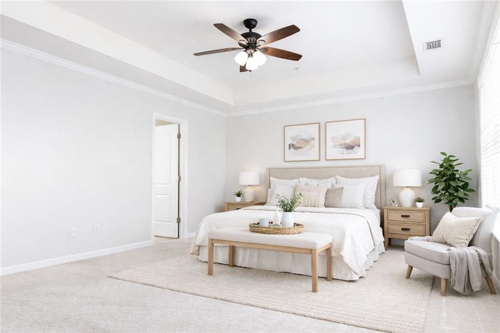 544 Ridge View Crossing Woodstock, GA 30188 - Photo 15 of 30 a bedroom with a bed and a chandelier